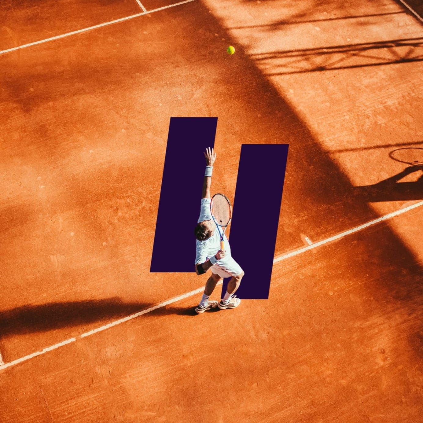 A person playing tennis in front of the I'm In logo