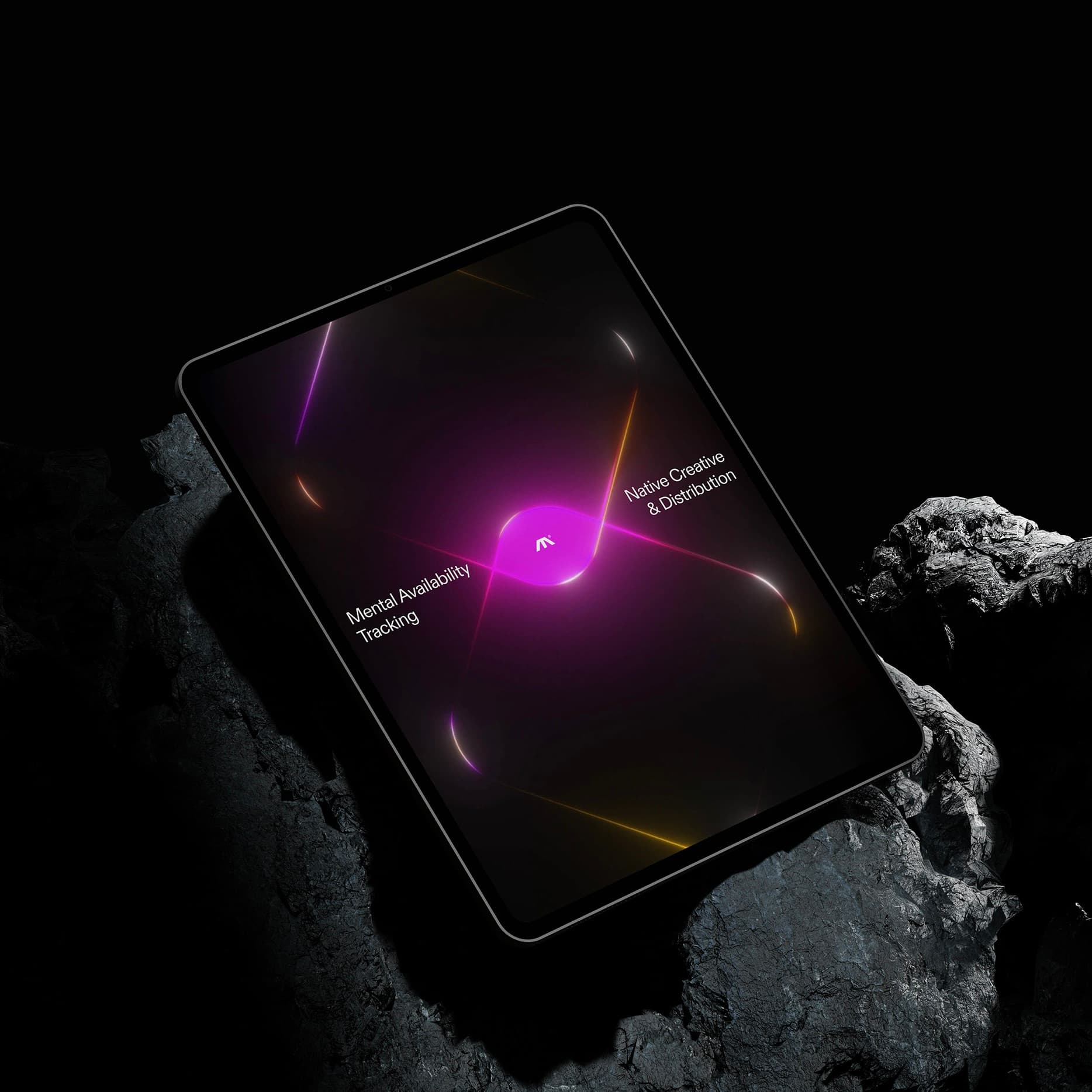 Moonbase's marketing services displayed on a tablet with purple light effects, resting on dark rocks.